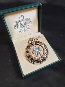 lot 69 image: Native American-Themed Pocket Watch with Necklace in Presentation Case