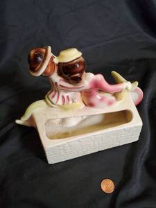 lot 111 image: Vintage Shawnee Pottery Couple on Bicycle Planter