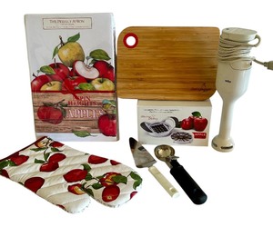 lot 95 image: Whimsical and Useful Apple  Baking Lot Including New Apron, Oven Mitt, Cutting Board and More