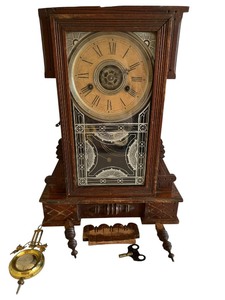 lot 94 image: Antique Wm. L Gilbert Oak Puck Mantle Clock