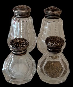 lot 16 image: Two Pairs of Vintage Sterling Silver Topped Salt and Pepper Shakers