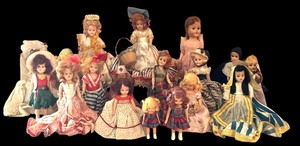 lot 417 image: Large Vintage Grouping of Dolls including a Nun, USA, Angel and More