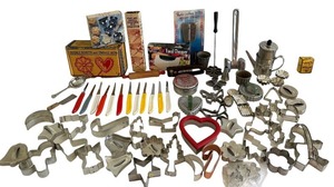 lot 361 image: Fun Vintage Kitchen Finds Cookie Cutters, Food Chopper, Vintage Double Rosette Iron and More