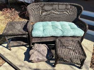 lot 28 image: Wicker Cushioned Patio Settee, Ottoman, Pillows and Side Table Patio Set