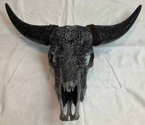 lot 17 image: Hand Carved Cow Skull