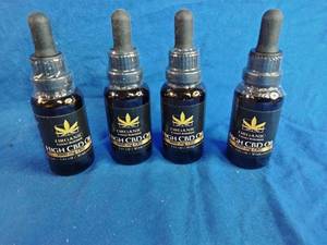 lot 240 image: Four New 1 oz Bottles of Organic 3000 mg CBD Oil