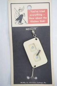 lot 103 image: Vintage Novelty Fishing Lure The Kitchen Sink