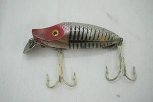 lot 134 image: Vintage Heddon River Runt Spook Sinker Fishing Lure