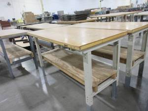 lot 202 image: STEEL FRAME, HEIGHT ADJUSTABLE WORK TABLES