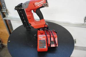 lot 25 image: Milwaukee Fuel Model XC50 Fuel Cordless M18 Finish Nailer With Charger