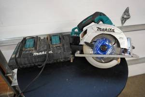 lot 36 image: Makita Model SH06 36 Volt Cordless Circular Saw With Charger