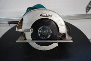 lot 38 image: Mikita Model 5007F Power Circular Saw