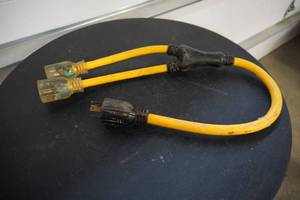lot 22 image: 220 Volt to 110 Volt 2 Cord Adaptor