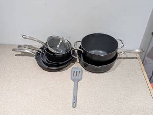 lot 63 image: TRAMONTINA 9PC. SET (7 POTSPANS, 1 LID, 1 SPATULA)