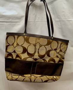 lot 14 image: Coach Signature Collection TanBrown Tote Handbag