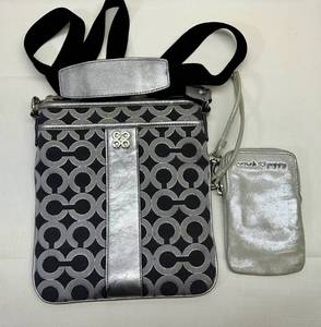 lot 21 image: Coach Julia OP Art Swingpack BlackSilver Crossbody Bag & Pouch Wristlet