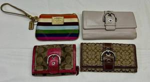 lot 25 image: 4x Coach Wallets