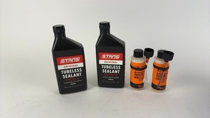 lot 504 image: Collection of Stans Tubeless Sealant and Orange Seal Endurance Sealant Bottles
