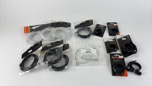 lot 515 image: Collection of Bicycle Cables and Seat Post Clamps by Sunlite