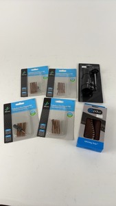 lot 552 image: Bicycle Accessory Kit Including Handlebar Grips and Tire Repair