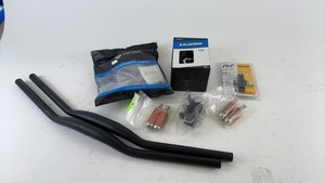 lot 703 image: Lot of Bicycle Parts Including Exustar Pedals and Lectric eBikes Accessories