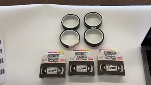 lot 333 image: Set of 4 Muc-Off Tubeless Rim Tape Rolls 28mm and 30mm