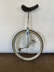 lot 64 image: Schwinn Unicycle with 24-Inch Wheel