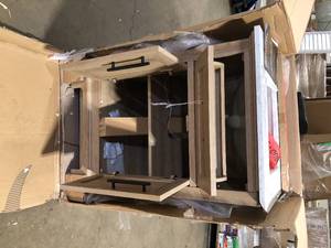 lot 23 image: Home Decorators Collection Doveton 24 in. Single Sink Freestanding Weathered Tan Bath Vanity with White Engineered Marble Top (Assembled)Broken on Granite   Customer Returns See Pictures