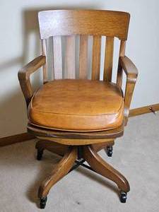 lot 45 image: Antique Tiger Oak Tank Style Office Chair