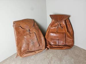 lot 241 image: Chic Leather Drawstring Backpacks