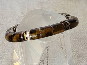 lot 119 image: Heavy 950 Sterling Silver Tigers Eye Gemstone Bracelet