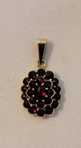lot 141 image: Lovely Garnet and 14K Gold Pendant
