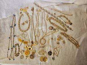 lot 153 image: Collection of Gold Costume Jewelry - Earrings, Bracelets, & Necklace