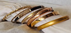 lot 156 image: Vintage Gold Costume Jewelry Bangles