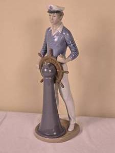 lot 74A image: Lladro Painted Ceramic Studio Art Statue - The Yachtsman - 5206