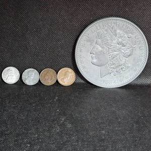 lot 23 image: Morgan 3 Token, 2 Steel Pennies, 1952 South African,14 Penny, 1899 Indian Head
