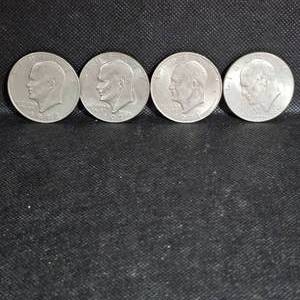 lot 26 image: 1971,1972,1974,1976, Ike Silver Dollars