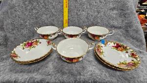 lot 75 image: Royal Albert Bone China, England, Country Rose Pattern-2 5.5 Saucers, 2 Dessert Fruit Bowls, 4 Soup Bowls
