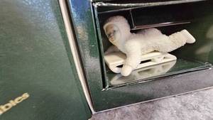 lot 100 image: Snowbabies Winter Surprise, Hold on Tight