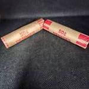lot 139 image: 2 Mint Rolls of Wheat Pennies