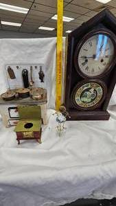 lot 94 image: Tin Stove waccessories, Clock