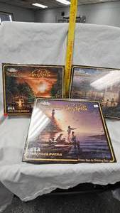 lot 99 image: 3 Terry Redlin Puzzles, never opened