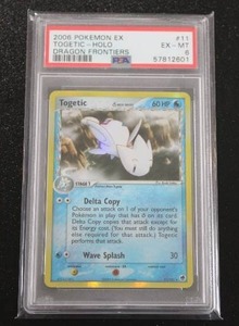 lot 66 image: 2008 Pokemon Dragon Frontiers Holo Togetic #11101 PSA 6