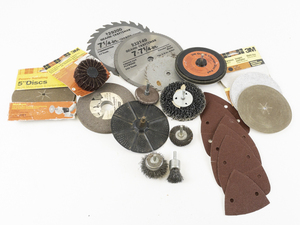 lot 137 image: Large Group Lot -Circular Saw Blades, Sand Paper & Tolls, Wheels, & More