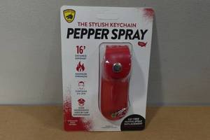 lot 29 image: Guard Dog Pepper Spray Keychain