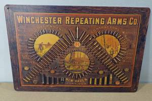 lot 87 image: Novelty Metal Sign -Winchester
