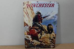 lot 88 image: Novelty Metal Sign -Winchester