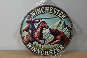 lot 90 image: Novelty Metal Sign -Winnchester