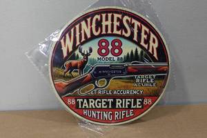 lot 91 image: Novelty Metal Sign -Winchester