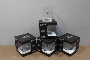 lot 98 image: 4 Lucky Shot Whiskey Glasses with Embedded Bullets